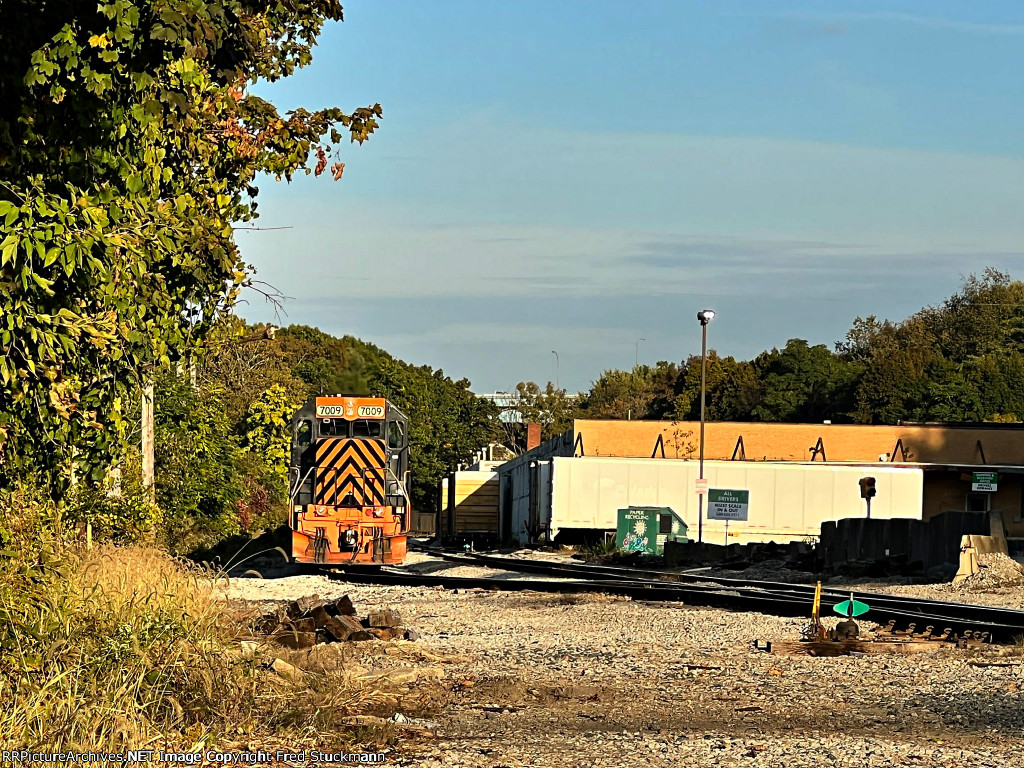 WE 7009 waits for the 711 crew to take it west.